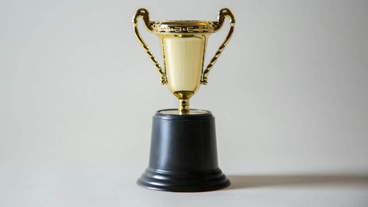 Yellow and white trophy
