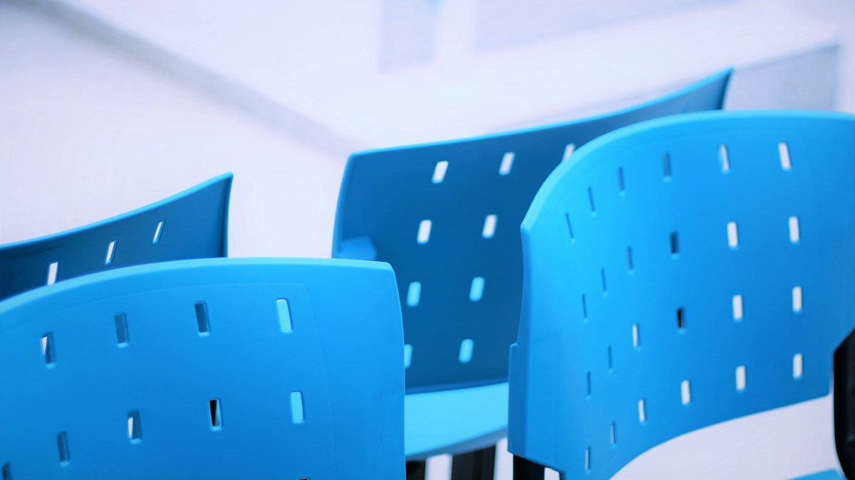 A group of blue chairs